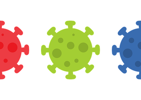 Three cartoon images of the SARS-CoV2 virus - red, green and blue